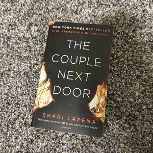 The Couple Next Door by Shari Lapena (pocket book)